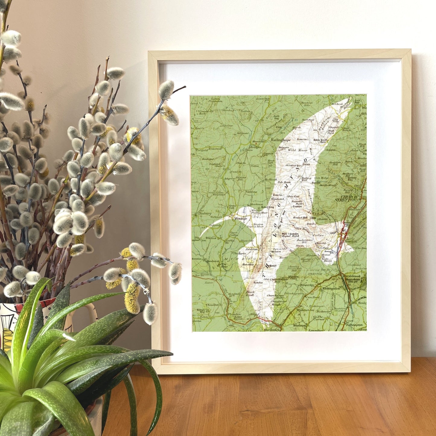 A bird and Ordnance Survey map area of your choice. A custom or personalised print.